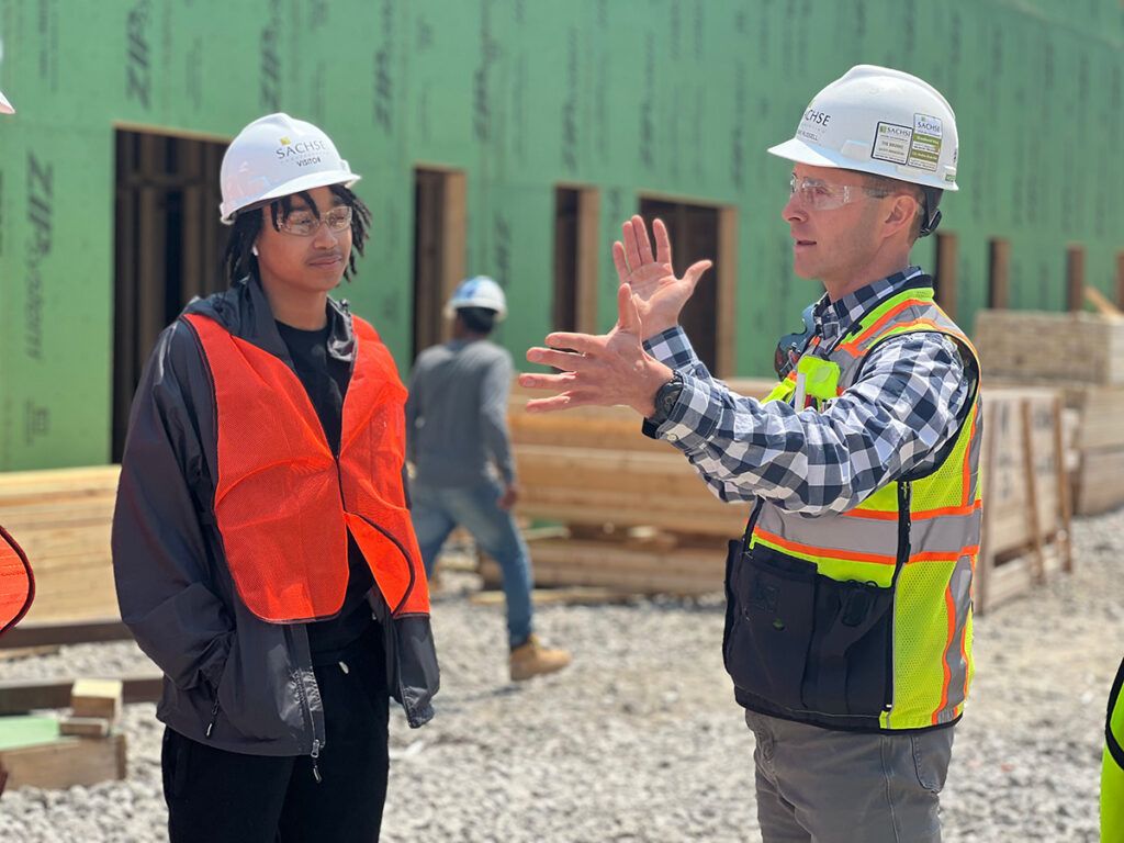 a teen interning with his supervisor