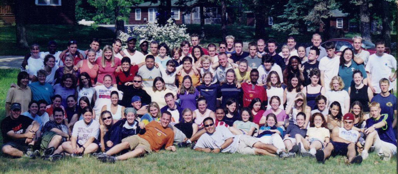 a picture of people smiling next to the camera