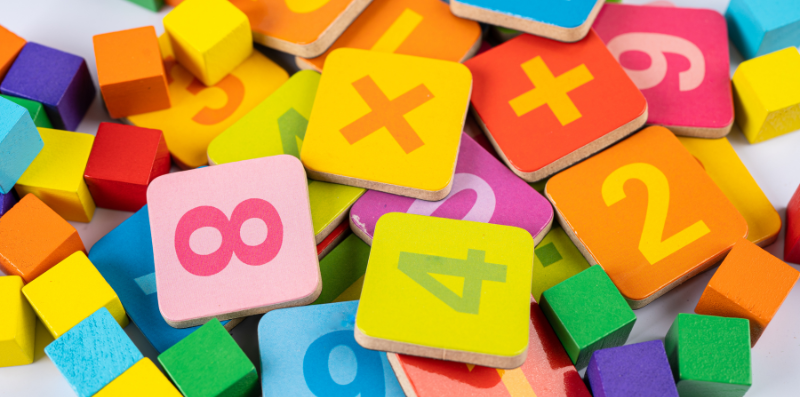 A pile of colorful foam number blocks