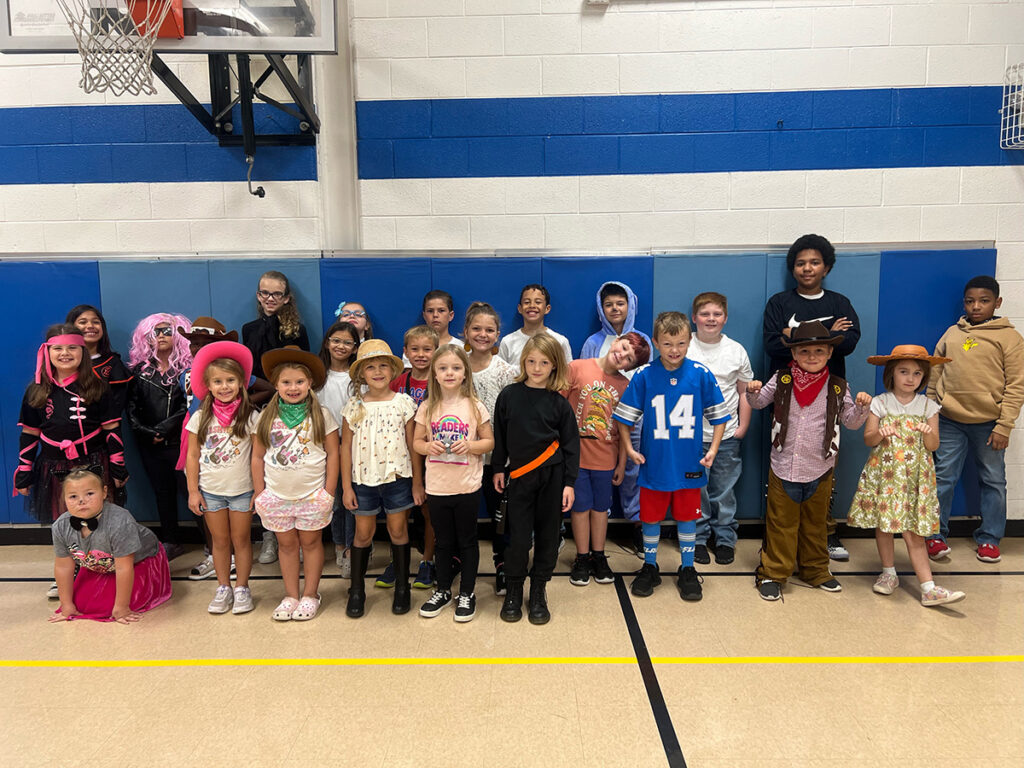 kids in Halloween costumes at a YMCA Learning Center